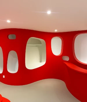 Mur intérieur design avec formes arrondies rouges et niches blanches